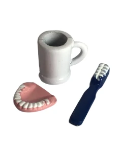 Toothbrush, Mug and Dentures