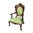 Ornately Carved Chair with Green Upholstery