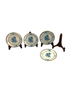 Four Wooden Plate Holders with Plates
