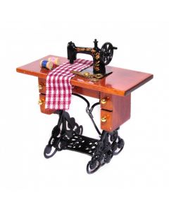 DF409 - Sewing Machine and Accessories on Table